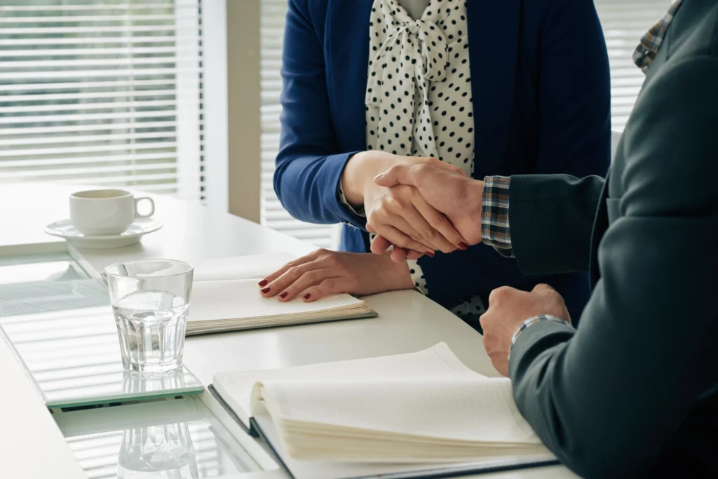 Professional business meeting discussing key factors in determining trustee compensation, ensuring transparency and fairness in financial governance.