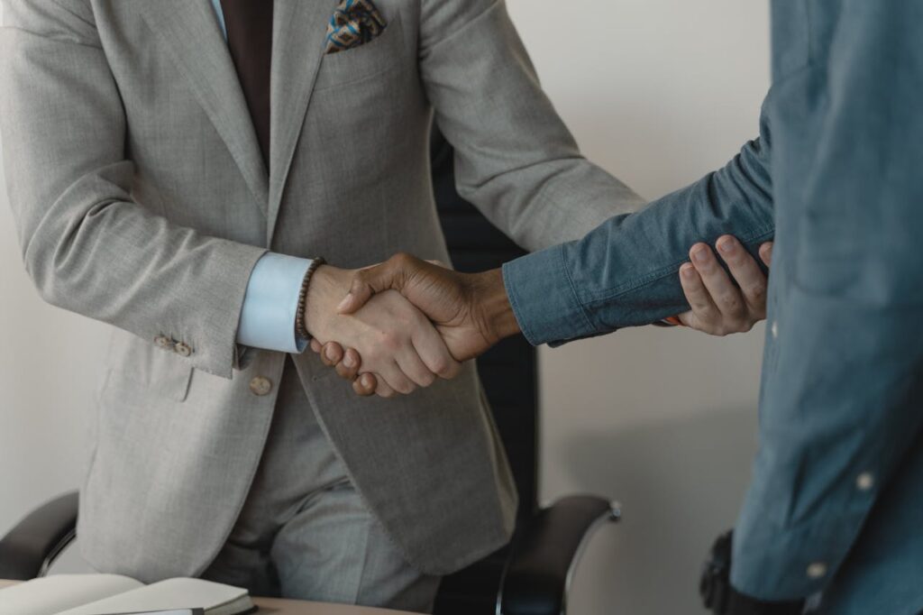 Photo of People Doing Handshake